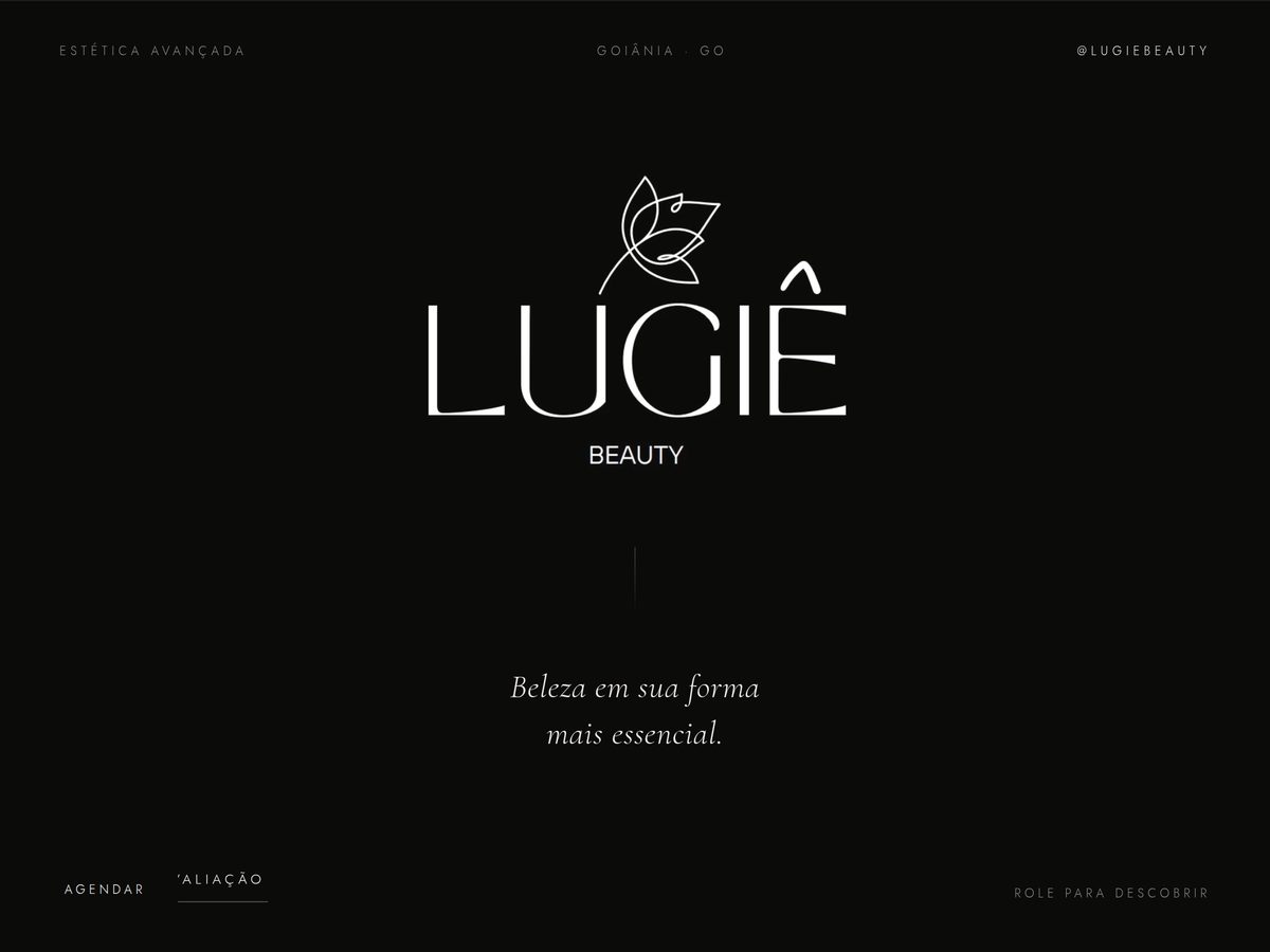 O site da Lugie Beauty num tablet deitado, com a marca centralizada sobre fundo escuro.